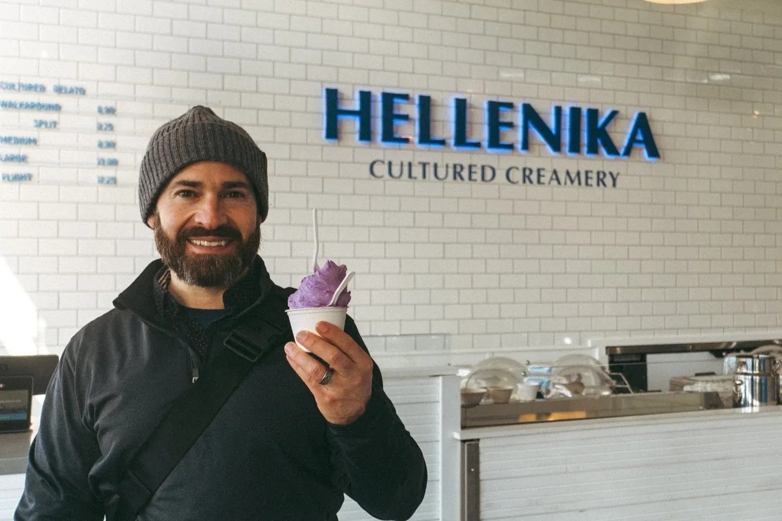 Dan grinning while holding an ice cream cone