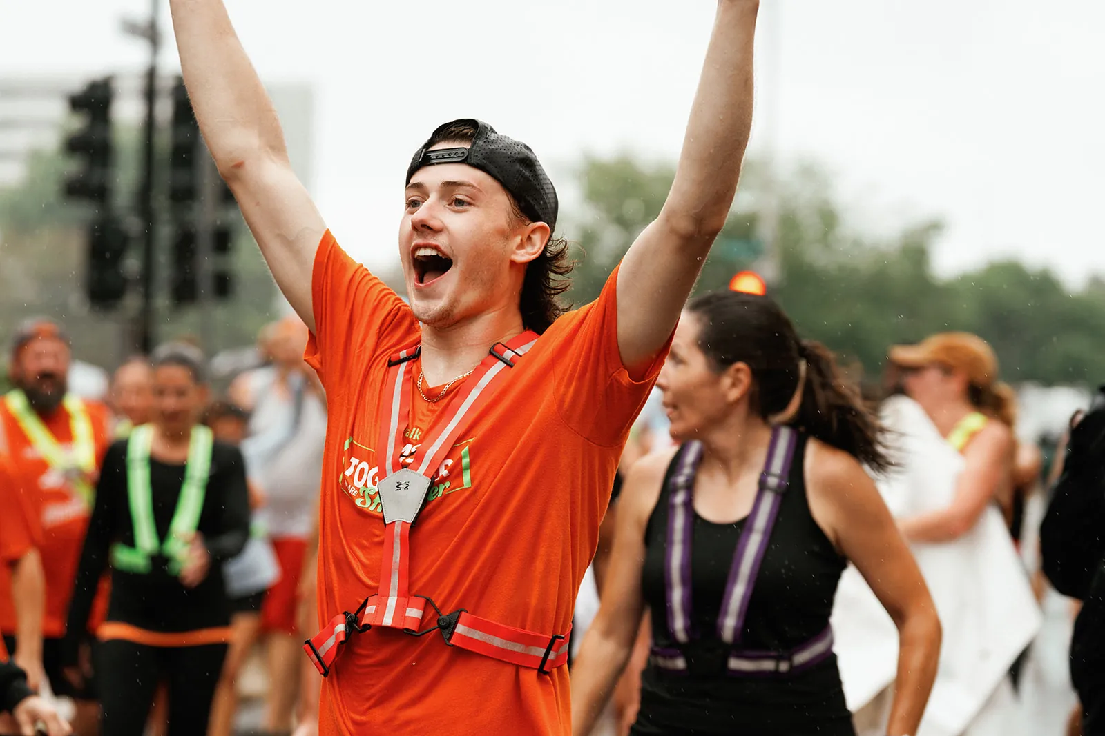 A runner cheering at the St Jude run in Peoria
